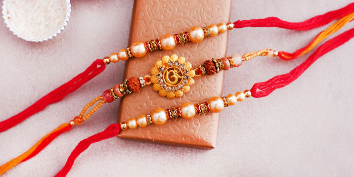 Spiritual Colorful OM Rakhi with Rudraksh